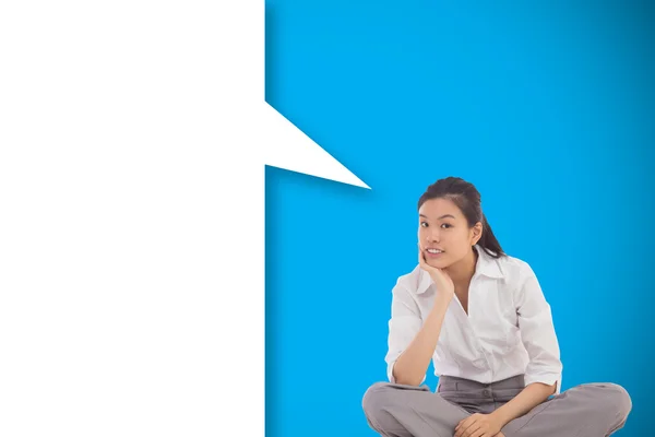 Businesswoman thinking with speech bubble — Stock Photo, Image