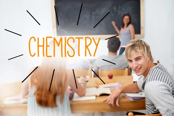 Chemistry against students in a classroom — Stock Photo, Image