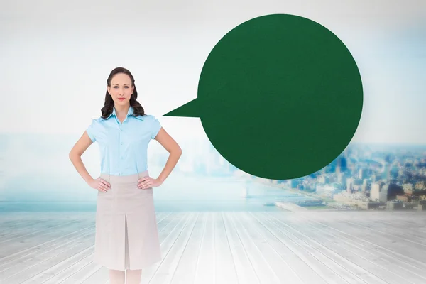 Businesswoman posing with speech bubble — Stock Photo, Image