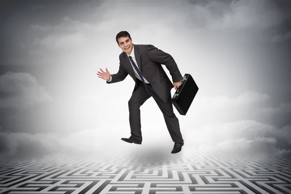 Cheerful businessman in a hurry — Stock Photo, Image