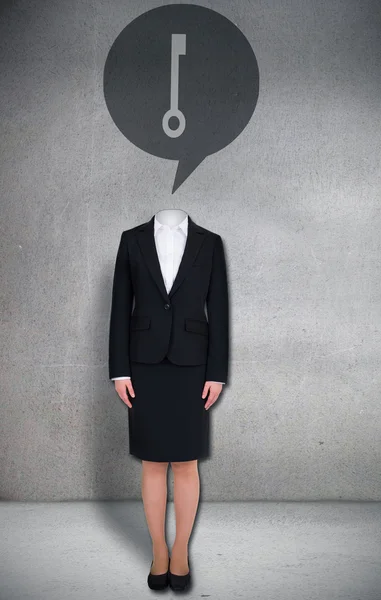 Headless businesswoman with key in speech bubble — Stock Photo, Image