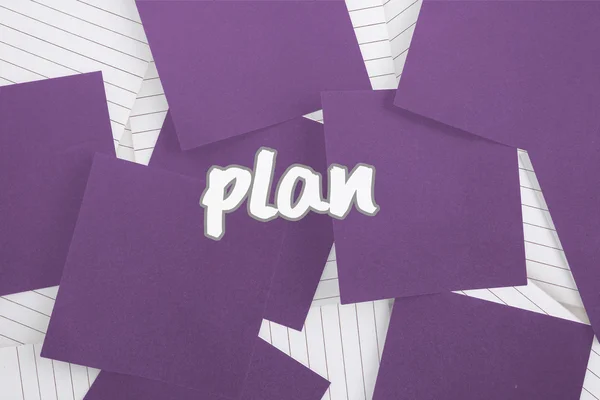 Plan against purple paper strewn over notepad — Stock Photo, Image
