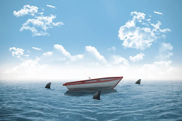 Sharks circling boat in the ocean — Stock Photo, Image