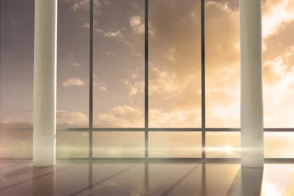 Room with windows showing sunrise — Stock Photo, Image
