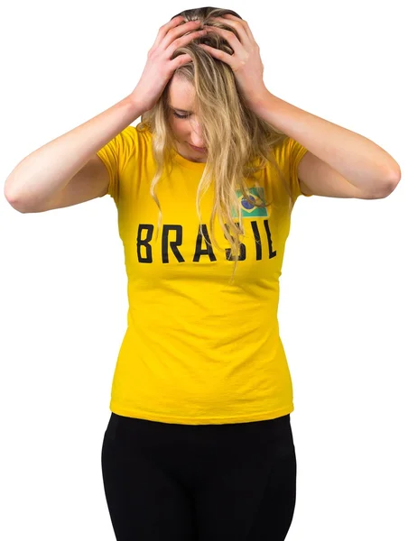 Disappointed football fan in brasil tshirt — Stock Photo, Image