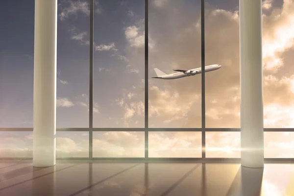 Flygplan som flyger förbi fönster — Stockfoto