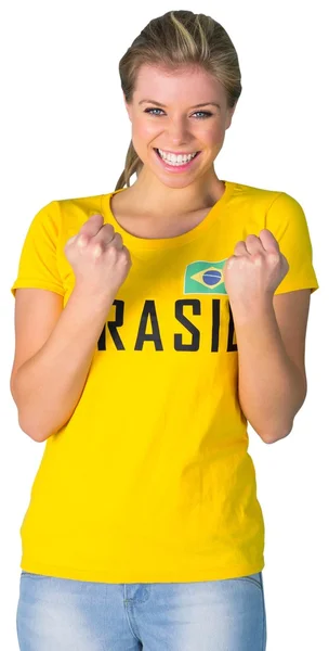 Excited football fan in brasil tshirt — Stock Photo, Image