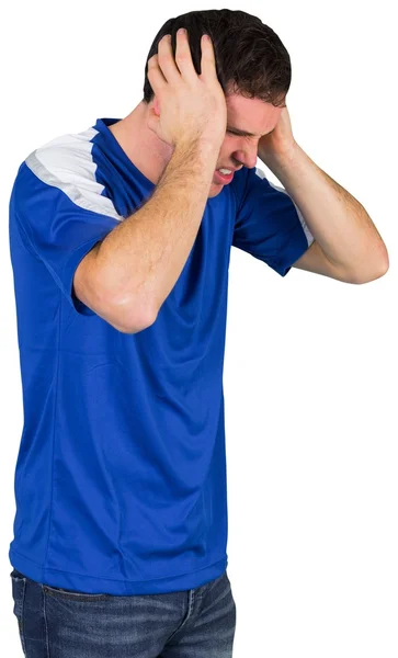 Teleurgesteld voetbalfan in blauw — Stockfoto