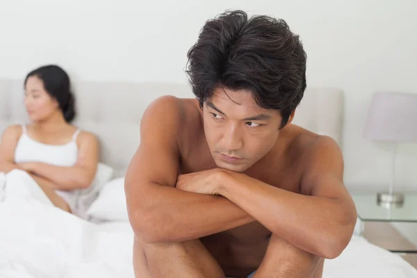 Couple not talking after argument in bed — Stock Photo, Image