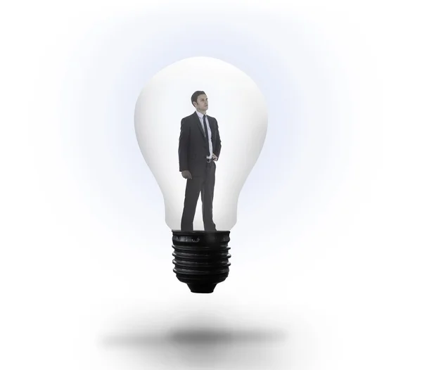 Pensando empresário em lâmpada — Fotografia de Stock