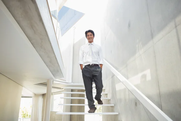 Man walking with hands in pockets — Stock Photo, Image