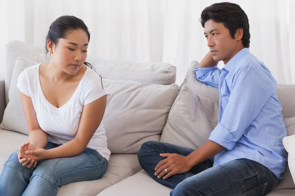 Couple not talking after a dispute on the sofa — Stock Photo, Image