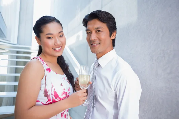 Happy couple toasting with champagne — Stock Photo, Image