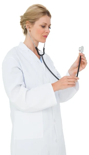 Doctor listening with stethoscope — Stock Photo, Image