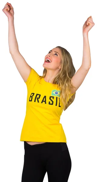 Excited football fan in brasil tshirt — Stock Photo, Image