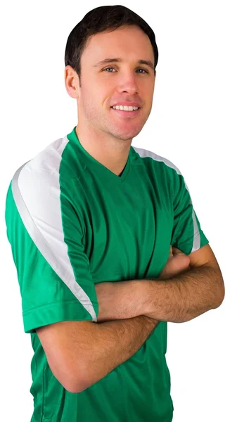 Handsome football fan in green — Stock Photo, Image