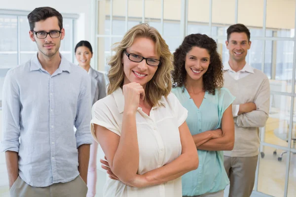 Business team smiling at camera — Stock Photo, Image