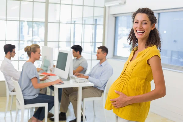 Pregnant businesswoman Stock Picture