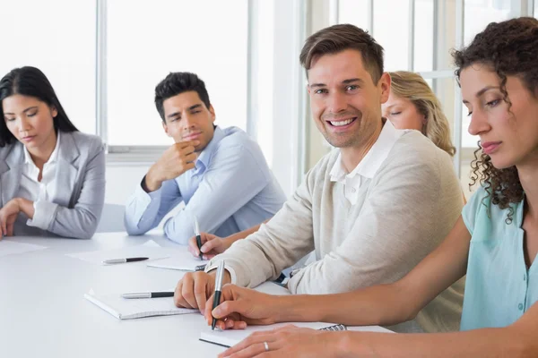 Empresário durante reunião — Fotografia de Stock