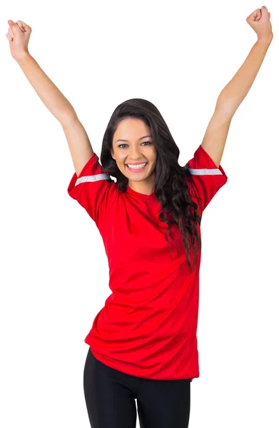 Cheering football fan in red — Stock Photo, Image