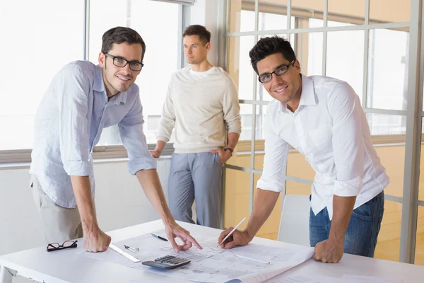 Architecture team working together at desk — Stock Photo, Image