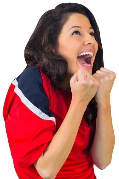 Cheering football fan in red — Stock Photo, Image