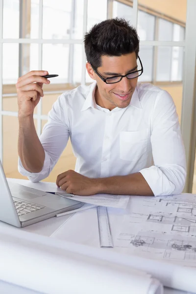 Architect working with laptop at desk — Stock Photo, Image