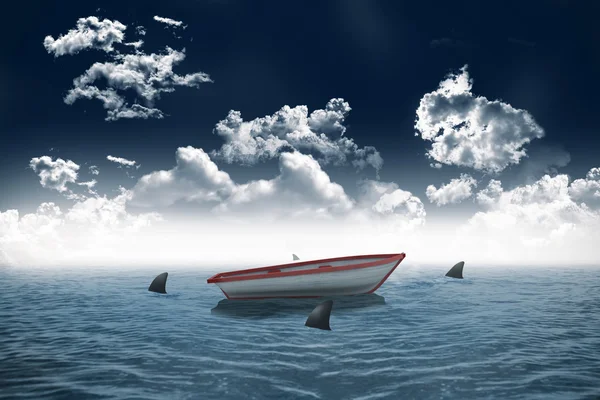 Sharks circling boat in the sea — Stock Photo, Image