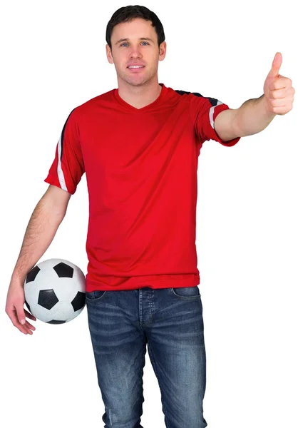 Abanico de fútbol en pelota roja — Foto de Stock