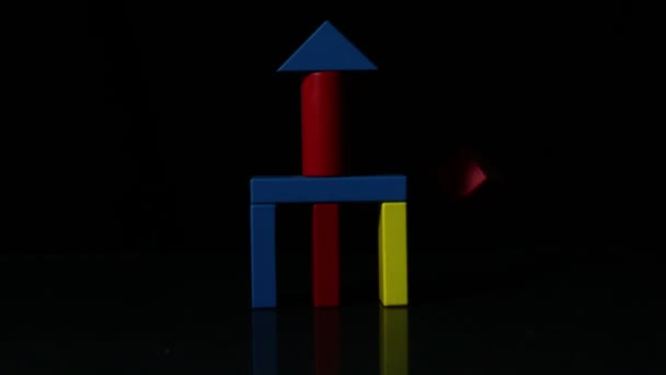 Building block tower falling over — Stock Video