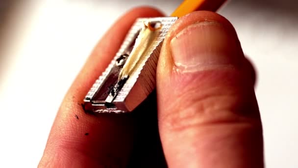 Man paring a pencil close up — Stock Video