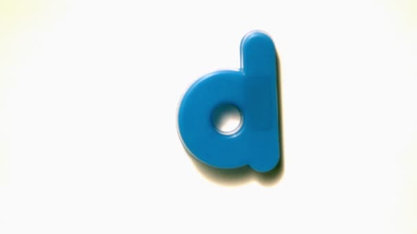 Blue letter d lifting off — Stock Video
