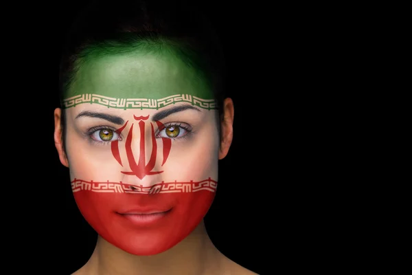 Imagen compuesta del ventilador de fútbol iraní en pintura facial — Foto de Stock