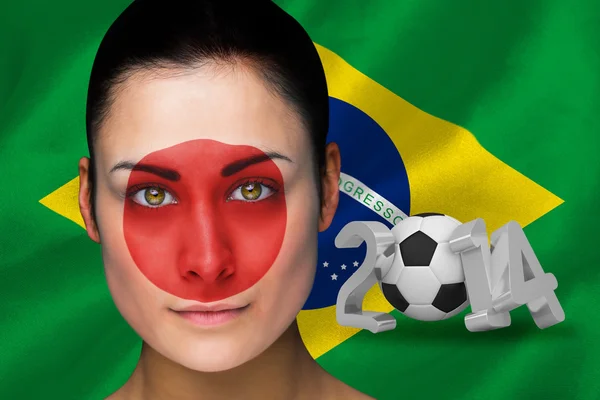 Imagen compuesta del ventilador de fútbol japonés en pintura facial —  Fotos de Stock