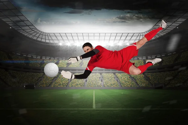 Fit goal keeper jumping up — Stock Photo, Image