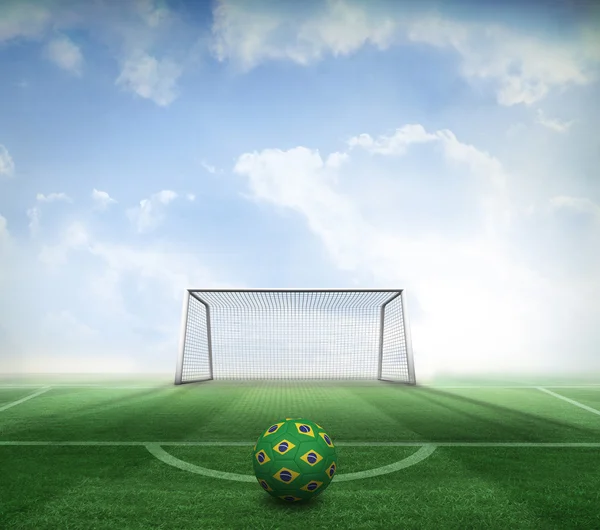 Composite image of football in brazilian colours — Stock Photo, Image