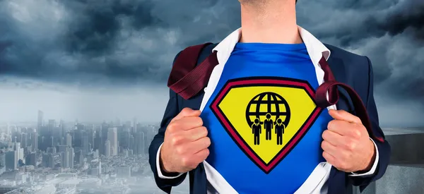 Businessman opening shirt in superhero style — Stock Photo, Image