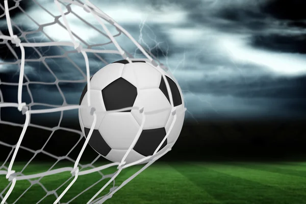 Composite image of football at back of net — Stock Photo, Image