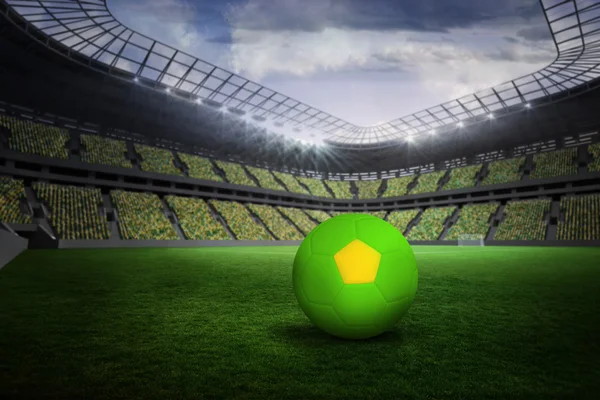 Composite image of bright green and yellow football — Stock Photo, Image