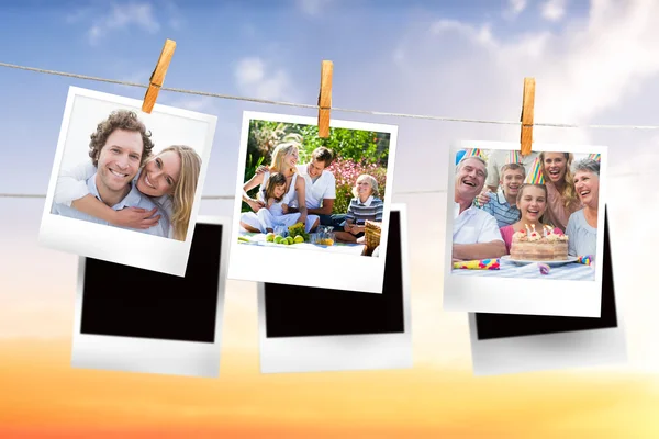 Composite image of instant photos hanging on a line — Stock Photo, Image