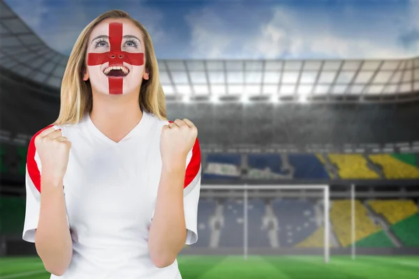 Composite image of excited fan england in face paint cheering — Stock Photo, Image