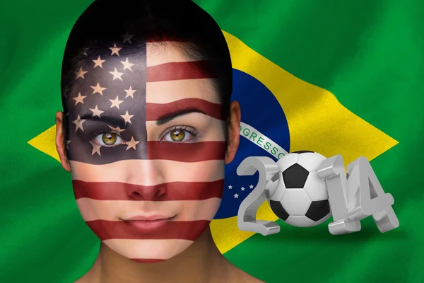 Composite image of america football fan in face paint — Stock Photo, Image