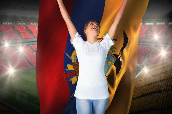 Pretty football fan in white cheering holding  flag — Stock Photo, Image