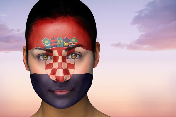 Imagen compuesta de hermosa morena en croatia facepaint — Foto de Stock