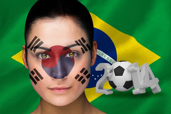 Złożony obraz Korei fan piłki nożnej w farby twarz — Zdjęcie stockowe