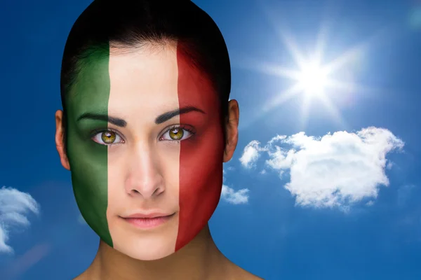 Composite image of beautiful brunette in italy facepaint — Stock Photo, Image