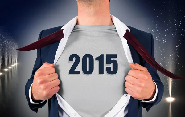 Businessman opening shirt in superhero style — Stock Photo, Image