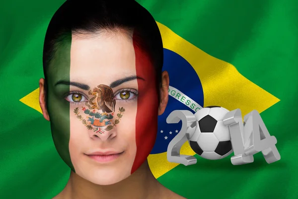 Composite image of mexico football fan in face paint — Stock Photo, Image