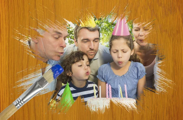 Imagem composta de família celebrando um aniversário — Fotografia de Stock