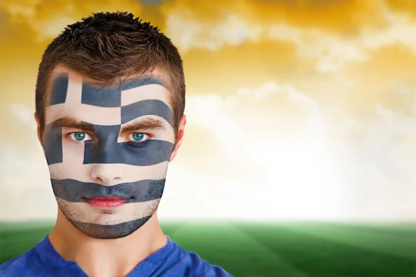 Greek football fan in face paint — Stock Photo, Image